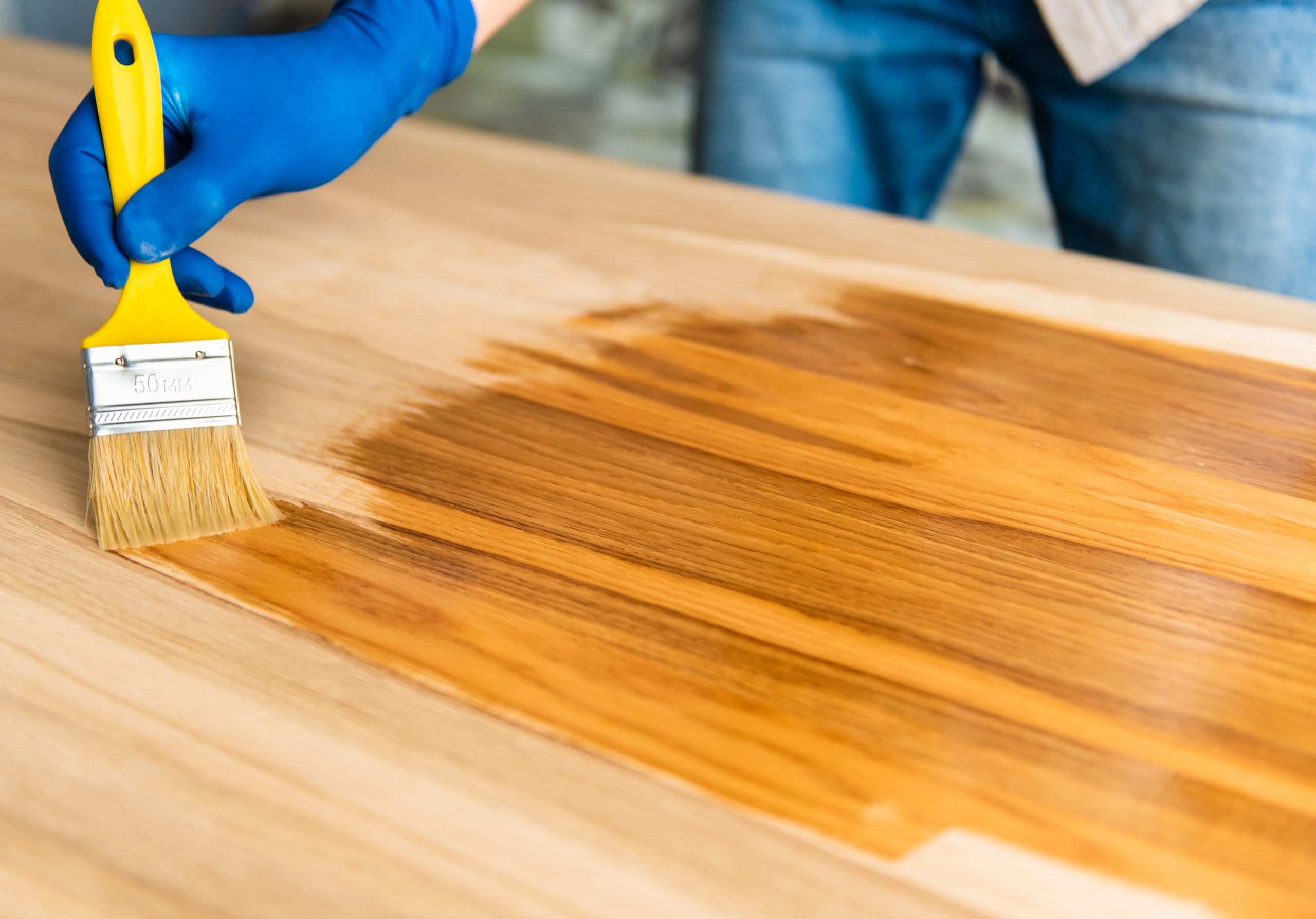 Worktop Refinishing in Bracknell with oil being applied to a solid oak hardwood kitchen worktop