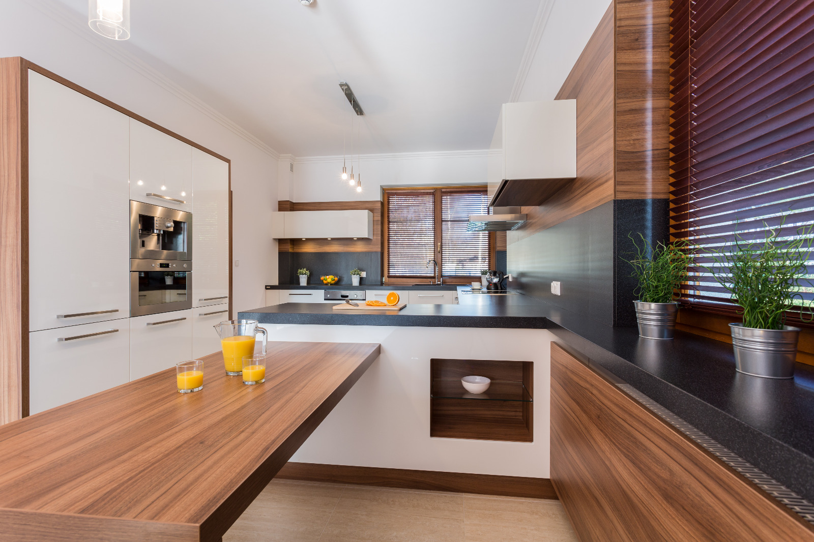 Worktop Refinishing in Bracknell featuring walnut solid wood kitchen worktops with a ceramic tile floor in a modern kitchen
